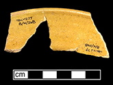 Midlands Yellow rim sherd of indeterminate vessel, possibly a plate, 8.5" diameter, with colorless lead glaze on interior and exterior of buff paste, identified by Jacqueline Pearce in May 1999, from Compton Site 18CV279.